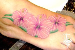 Pink Ink Hibiscus Flowers Tattoo On Right Foot