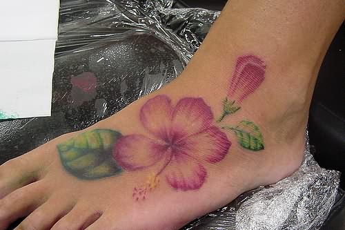 Purple Ink Hibiscus Flower Tattoo On Foot
