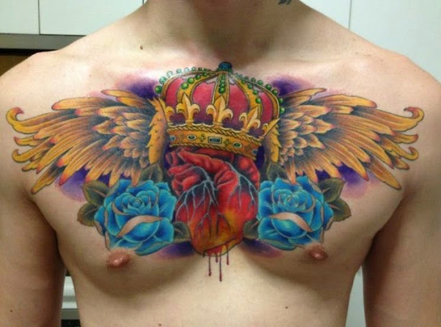 Real Heart And Crown With Wings Tattoo On Chest