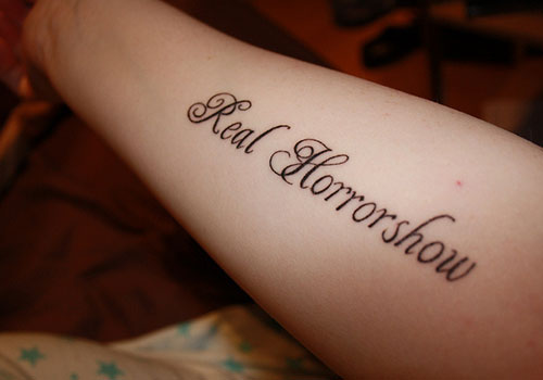 Real Horrorshow Words Tattoo On Right Forearm