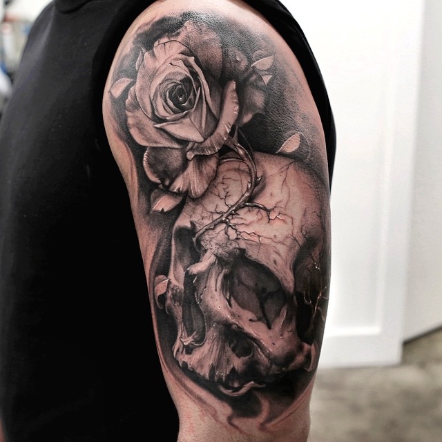 Realistic Skull And Rose Flower Half Sleeve Tattoo