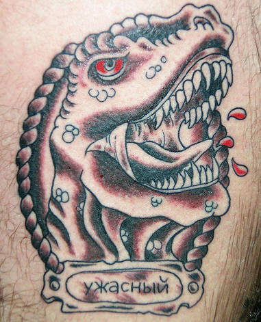 Red Eye Dinosaur Head Tattoo