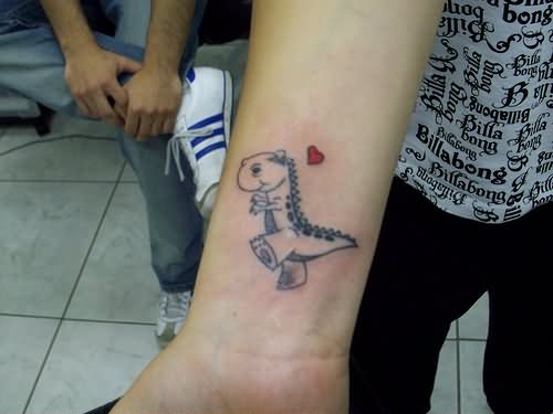 Red HEart And Dinosaur Tattoo On Wrist
