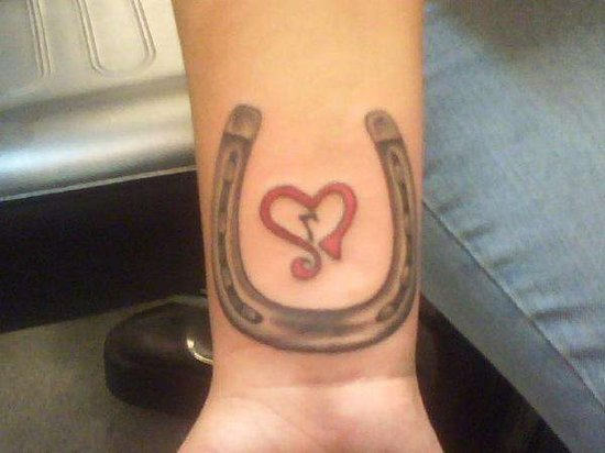 Red Heart And Horse Shoe Tattoo On Right Wrist
