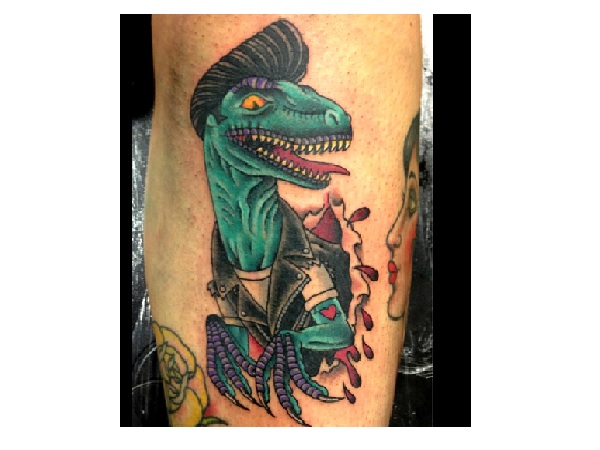 Ripped Skin Dinosaur Tattoo On Leg