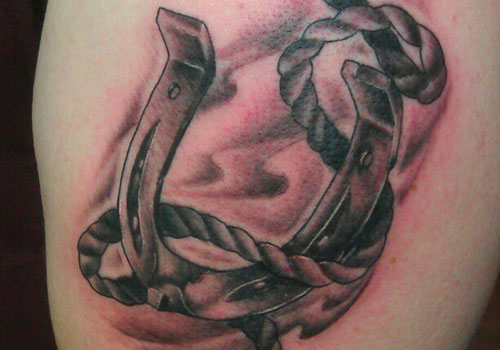 Rope And Horse Shoe Tattoo