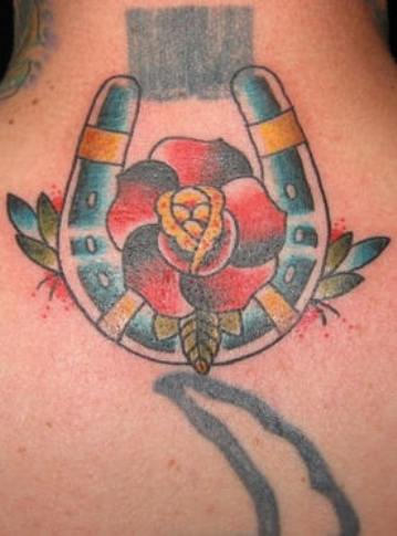 Rose Flower And Horseshoe Tattoo On Upper Back