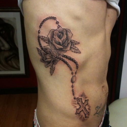 Roses With Rosary Cross Tattoo On Man Right Side Rib