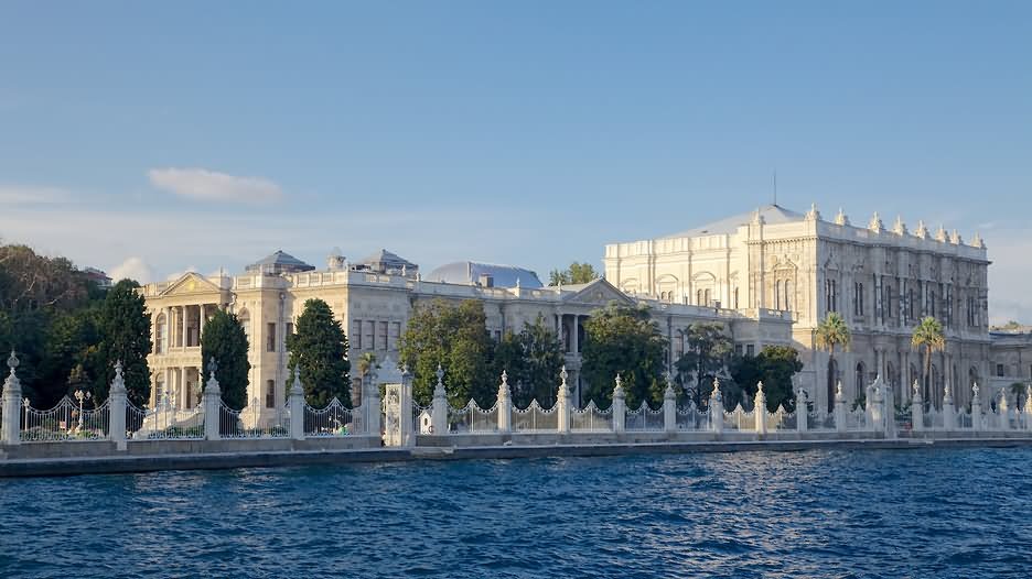 Side View Of The Dolmabahce Palace Across The Bosphorus River