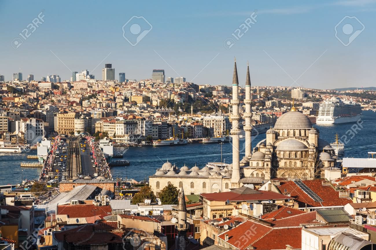 Side View Of The Yeni Cami And Galata Bridge In Istanbul