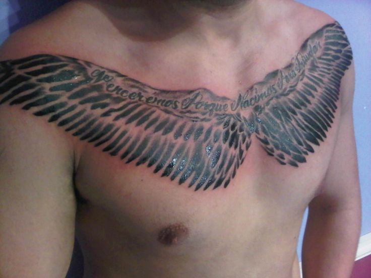 Simple Black Ink Wings Tattoo On Man Chest