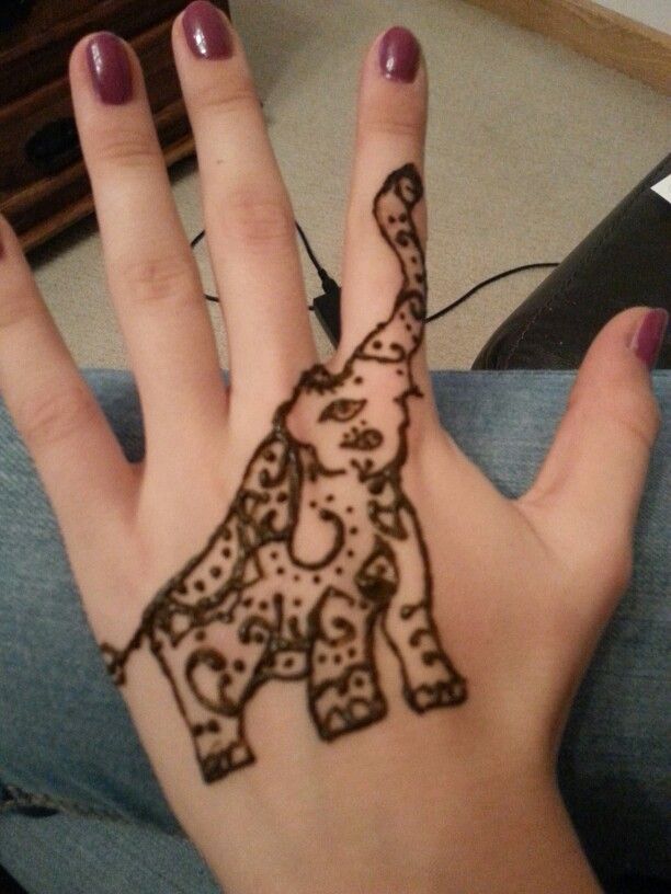 Simple Henna Elephant Tattoo On Girl Hand