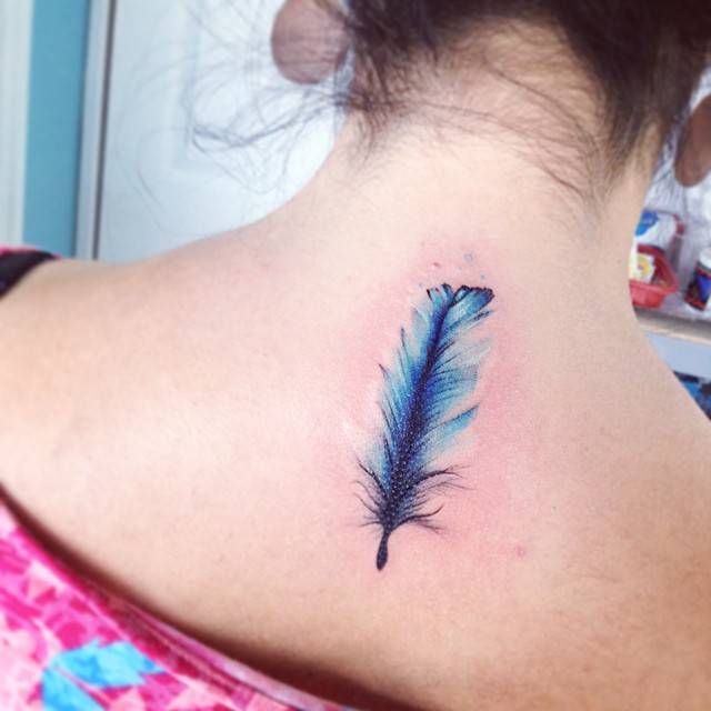 Simple Watercolor Feather Tattoo Design For Upper Back