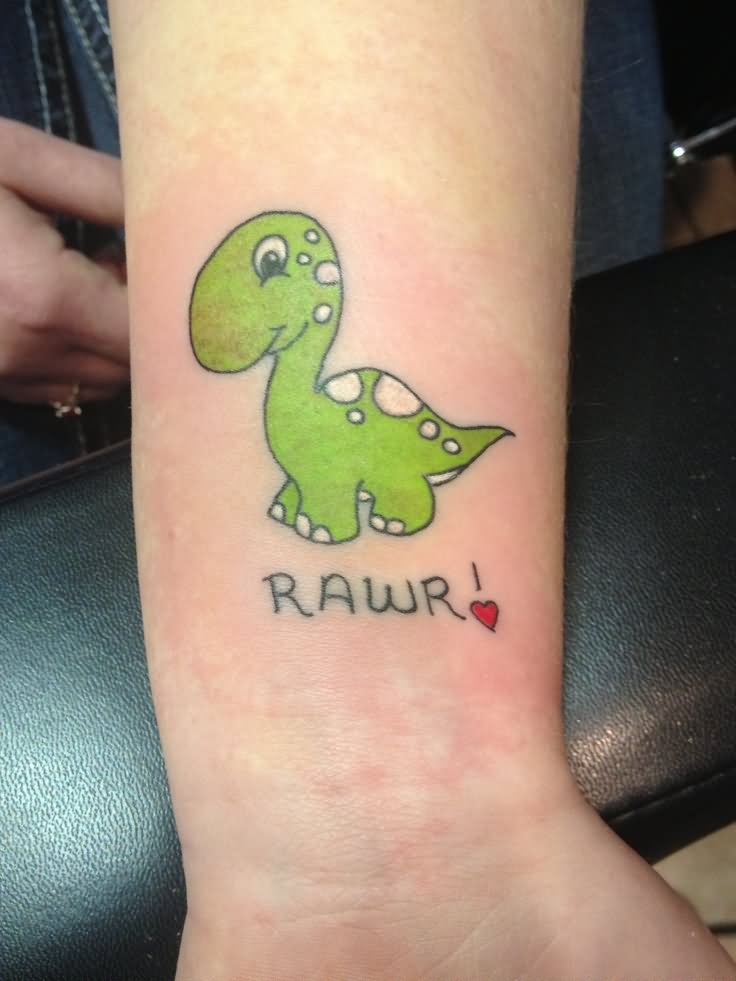 Small Green Dinosaur Tattoo On Left Wrist
