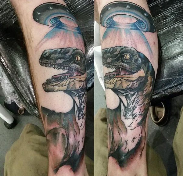 Spaceship And Dinosaur Tattoo On Arm