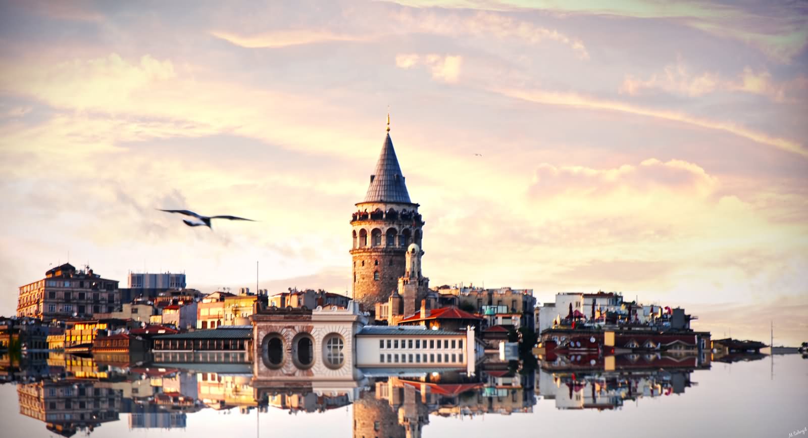 Sunset View Image Of The Galata Tower Across The Bosphorus River
