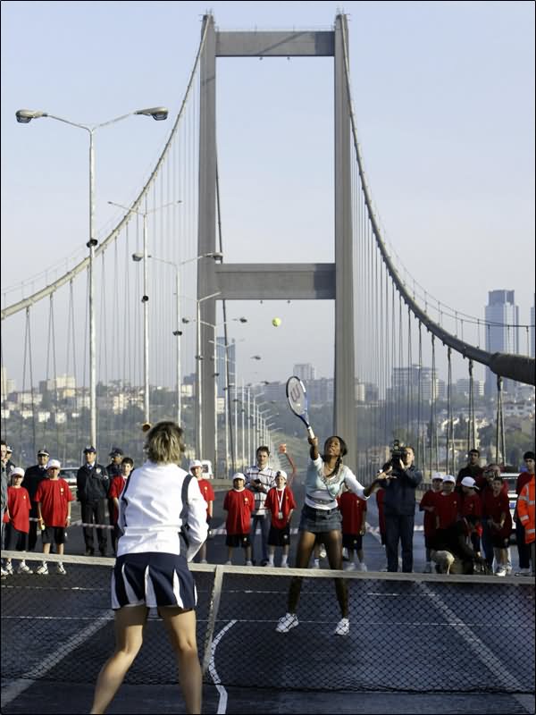 Tennis Player At The Bosphorus Bridge In Istanbul
