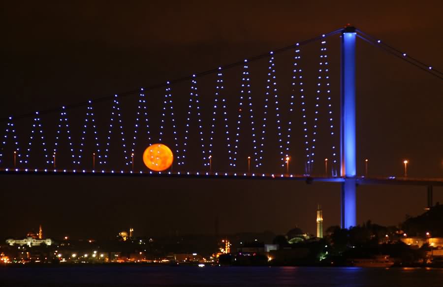 The Bosphorus Bridge At Night With Full Moon