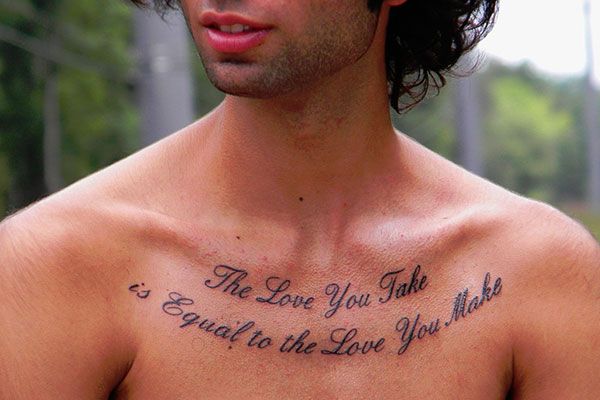 The Love You Take Is Equal To The Love You Make Quote Tattoo On Man Chest