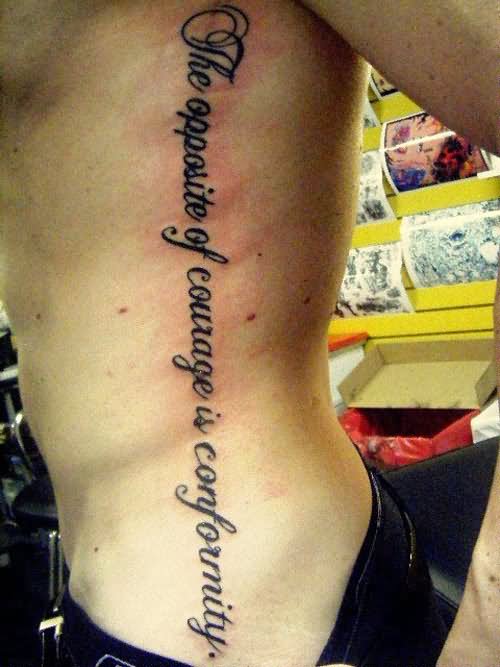 The Opposite Of Courage Is Conformity Lettering Tattoo On Man Left Side Rib