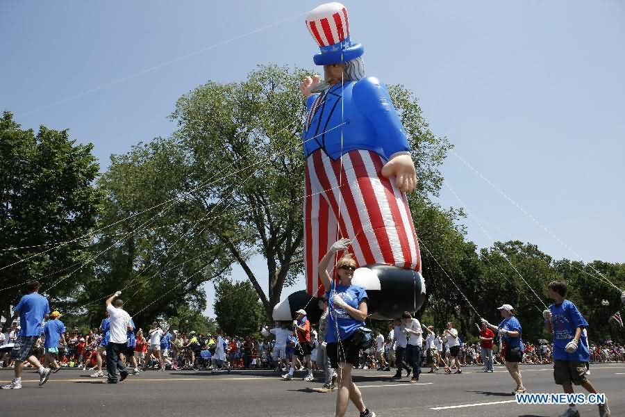 The Uncle Sam Balloon Floats During The United States Independence Day Parade