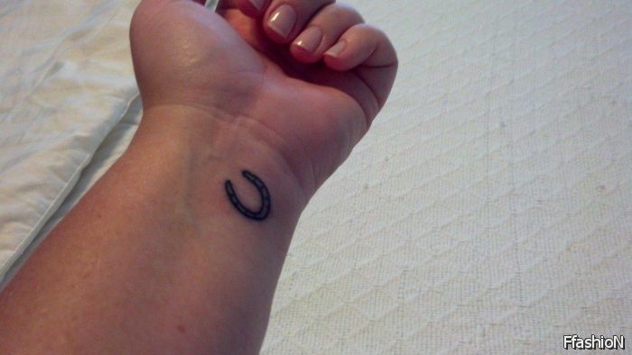 Tiny Simple Horseshoe Tattoo On Wrist