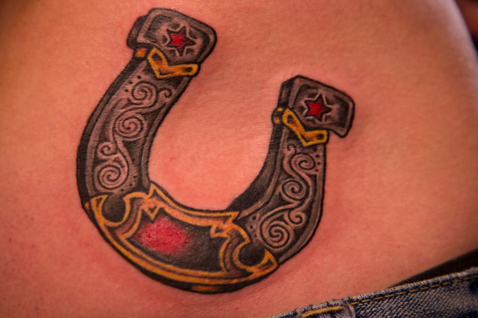Traditional Horse Shoe Tattoo On Waist