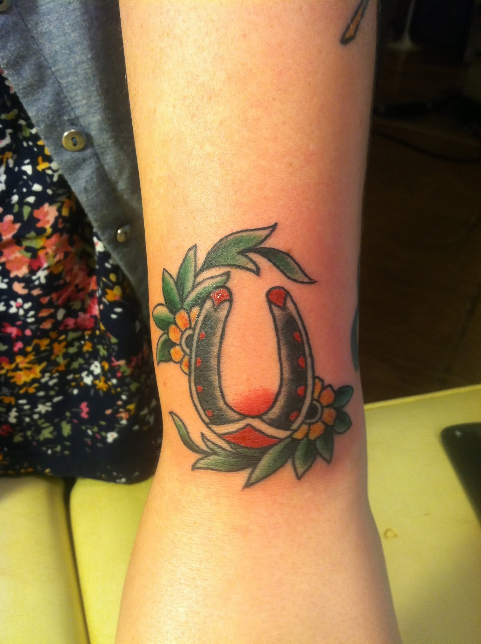 Traditional Horseshoe Tattoo On Left Wrist