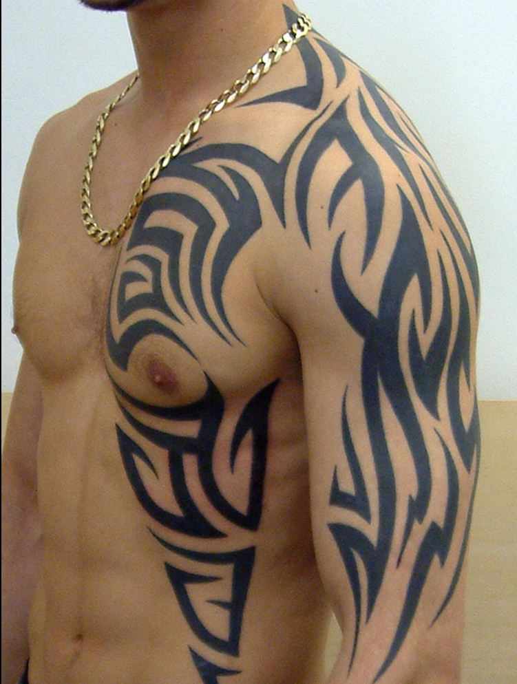 Tribal Tattoo On Chest And Half Sleeve