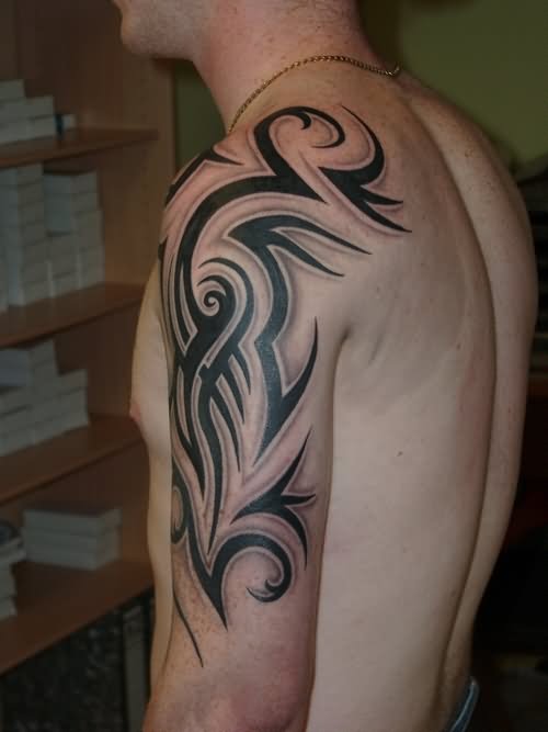 Tribal Tattoo On Man Half Sleeve