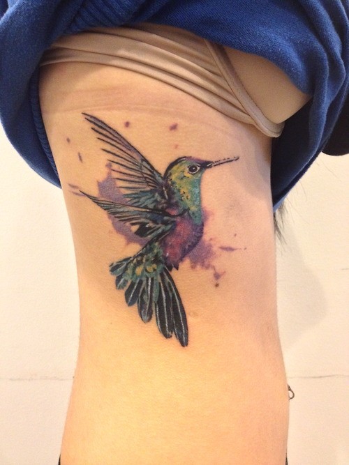 Watercolor Bird Tattoo On Girl Right Side Rib
