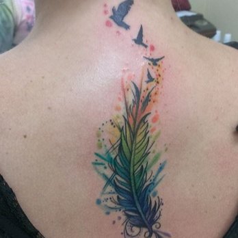 Watercolor Feather With Flying Birds Tattoo On Upper Back