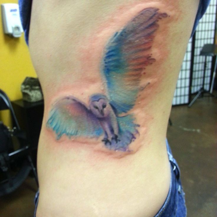 Watercolor Flying Owl Tattoo On Side Rib