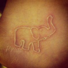 White Ink Elephant Tattoo Design