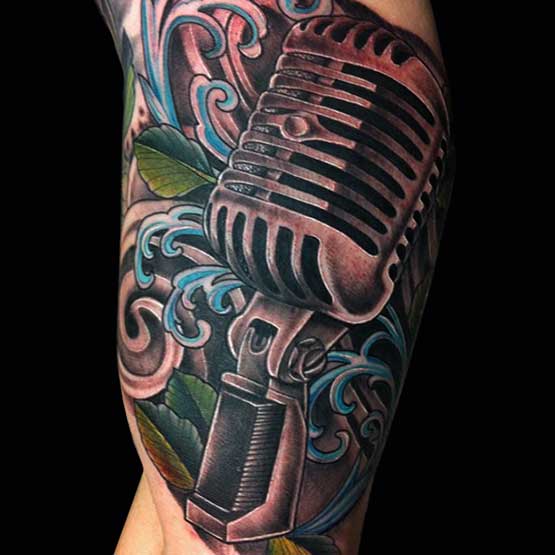 Amazing Microphone Tattoo On Muscles