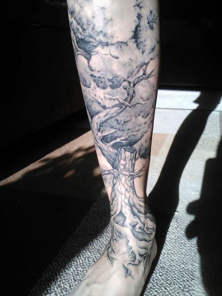 Attractive Grey Ink Tree Tattoo On Leg