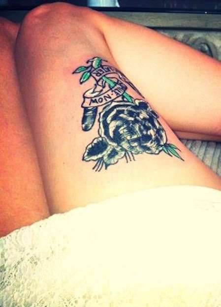 Banner And Flower Tattoo On Right Thigh