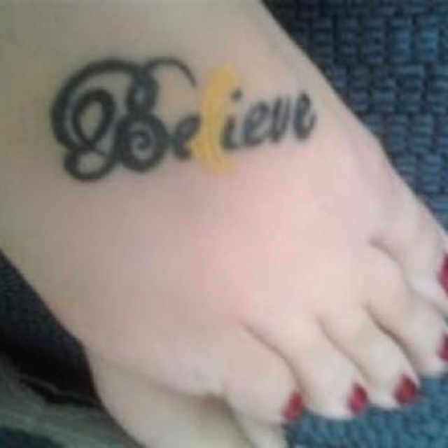 Believe Yellow Ribbon Tattoo On Right Foot
