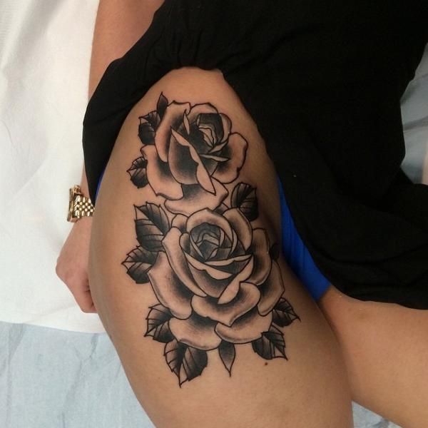 Black And Grey Rose Flowers Tattoo On Thigh by Pat Whiting