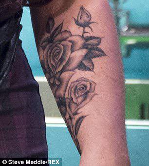 Black And Grey Roses Tattoo On Left Forearm