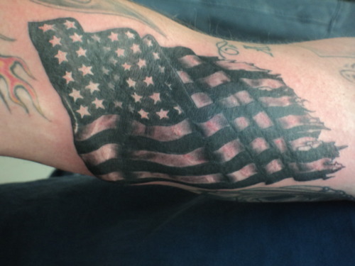 Black And Grey USA Flag Tattoo Design For Sleeve