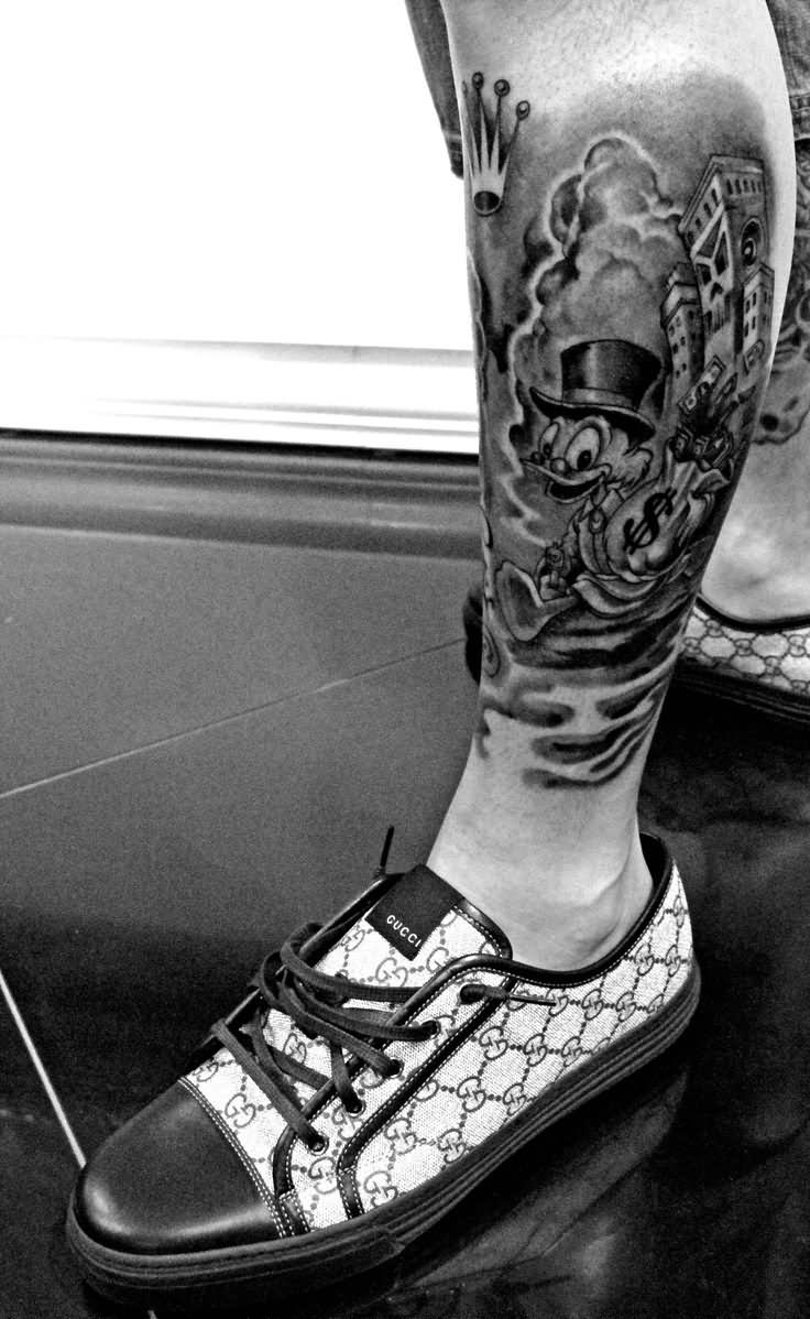 Black And White Donald Duck Tattoo On Left Leg