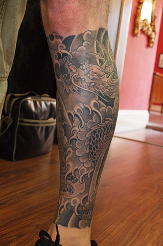 Black And White Dragon Tattoo On Leg
