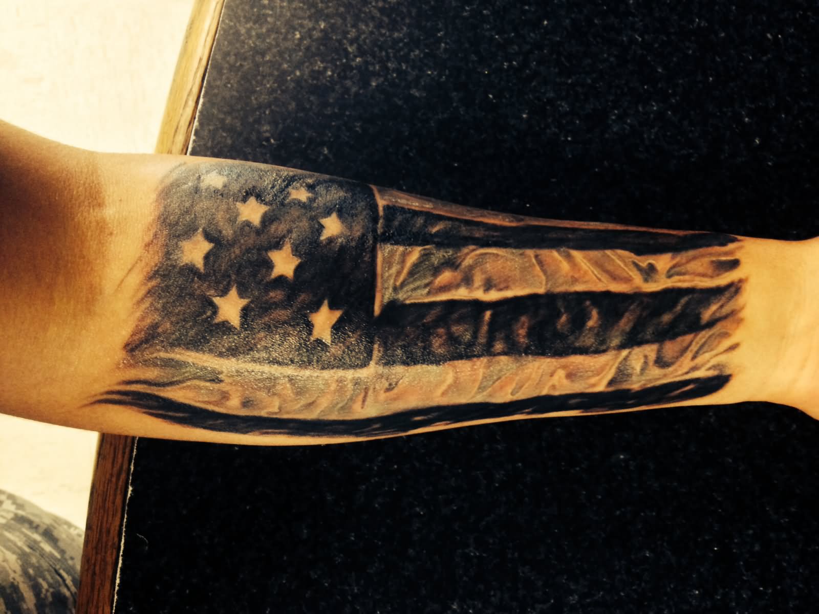 Black And White USA Flag Tattoo On Forearm