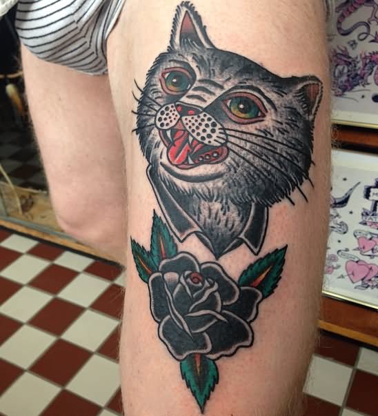 Black Rose Flower And Grumpy Cat Tattoo On Left Thigh