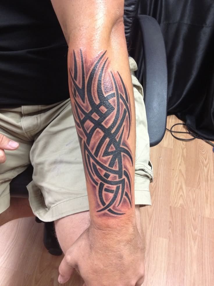 Black Tribal Design Tattoo On Left Forearm