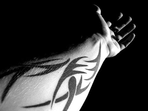 Classic Black Tribal Design Tattoo On Forearm