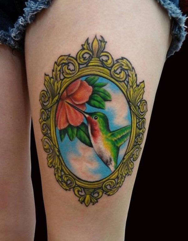 Color Hummingbird In Frame Tattoo On Thigh