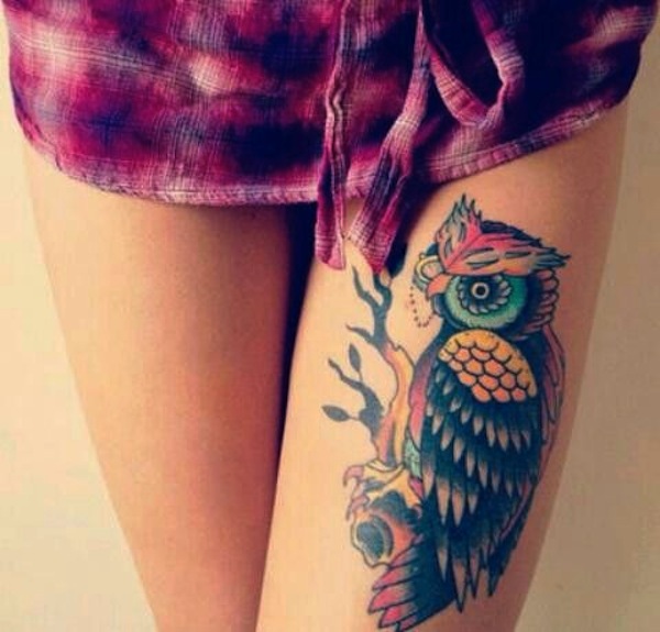 Colored Owl Tattoo On Girl Left Thigh