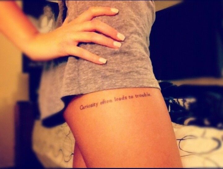 Curiosity Often Leads To Trouble Quote Tattoo On Girl Right Upper Leg